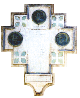 Polsi: croce sulla facciata del santuario